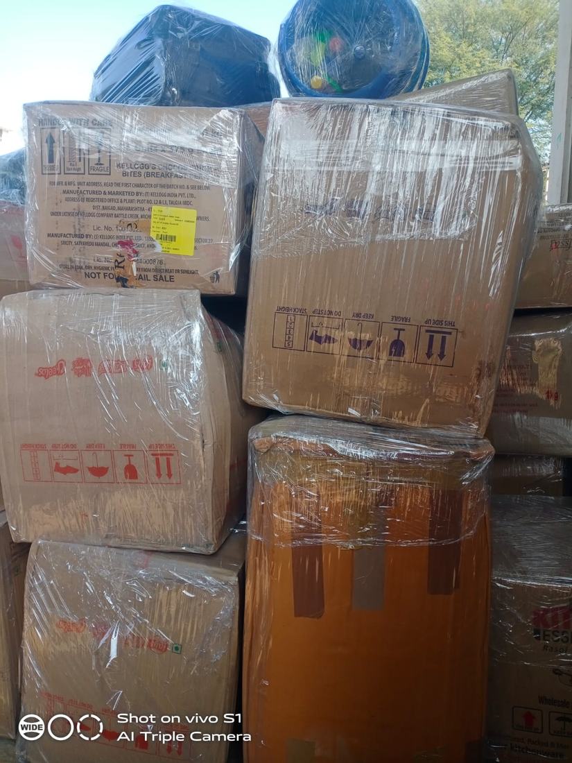 Shrink-wrapped cartons stacked and ready for transport